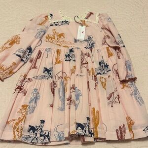 NWT Pink Chicken 4Y pink rodeo/cowgirl tiered dress
Fully lined
Zipper back